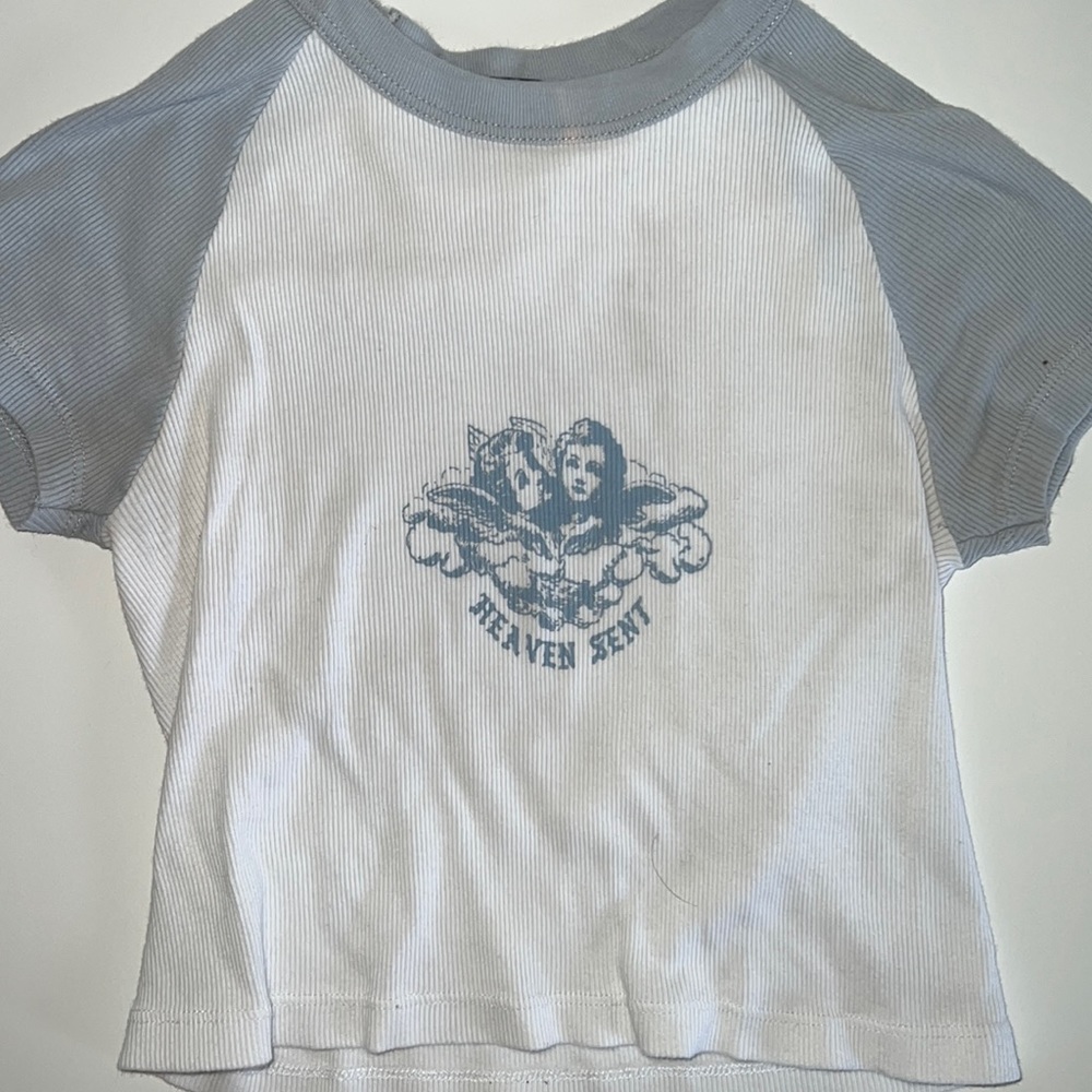 Brandy Melville white and baby blue stretchy crop top “Heaven Sent”.